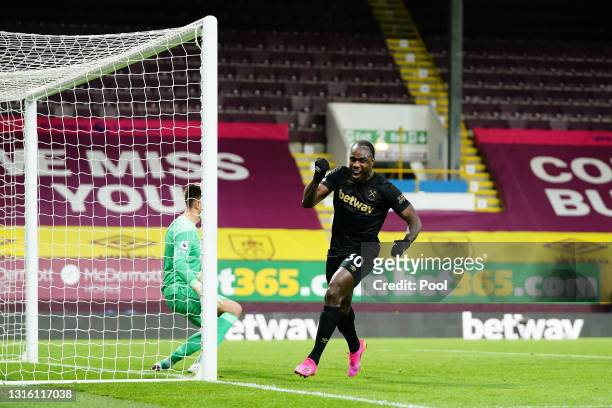 Michail Antonio of West Ham United celebrates after scoring their side's second goal during the Premier League match between Burnley and West Ham...
