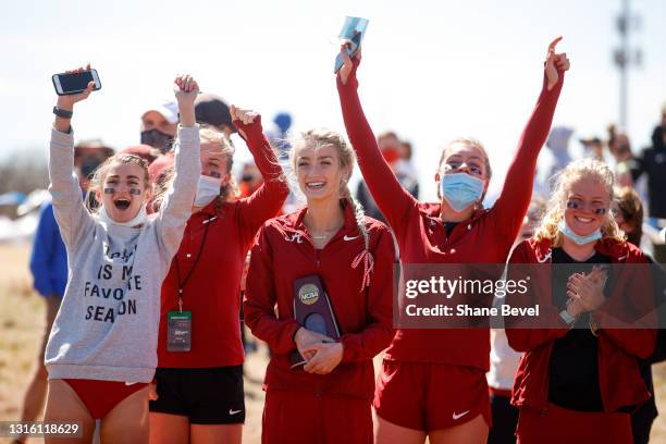 The of the Alabama Crimson Tide celebrates during the Division I Men's and Women's Cross Country Championships held at the OSU Cross Country Course...