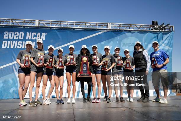 The the BYU Cougars women's cross country team pose with their trophies after winning the team championship during the Division I Men's and Women's...