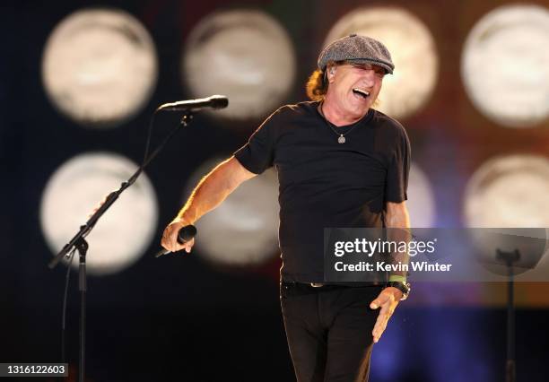 In this image released on May 2, Brian Johnson of music group AC/DC performs onstage with music group Foo Fighters during Global Citizen VAX LIVE:...