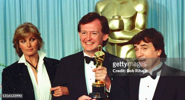 Bo Derek, Best Costume Design Winner James Acheson and Dudley Moore at the 61st Annual Academy Awards Show, March 29, 1989 in Los Angeles, California.