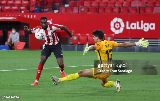 Inaki Williams of Athletic Club scores their side's first goal past Yassine Bounou of Sevilla during the La Liga Santander match between Sevilla FC...