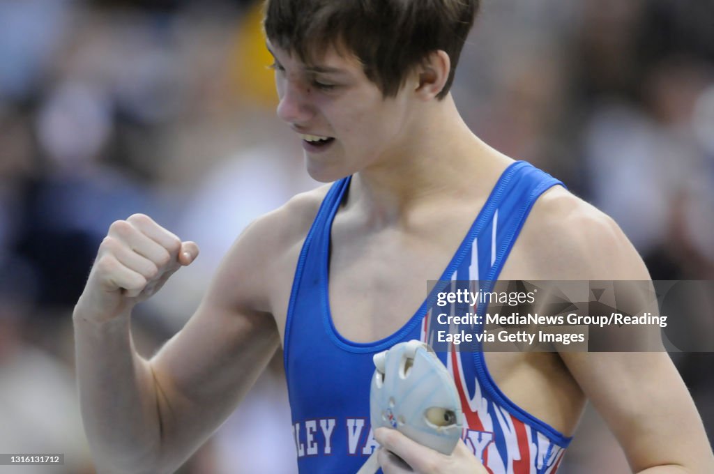Fick celebrates his second-period pin.Oley Valley's Joey Fick pins Palmerton's Sam Oberlander in 2:06 to place seventh at 120 pounds.WRESTLING PIAA-AA individual championships at the Giant Center, Hershey. Photo by Jeremy Drey3/10/2012