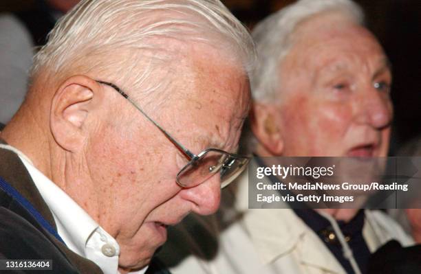 Edmond Palka, Reading, Seaman 1st Class Navy, and longtime friend George E. Stauffer, Shillington, Captain in the Air Force and POW in Bucharest, cry...