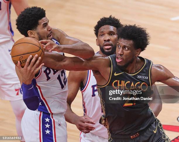 Tobias Harris of the Philadelphia 76ers and Thaddeus Young of the Chicago Bulls battle for a rebound at the United Center on May 03, 2021 in Chicago,...