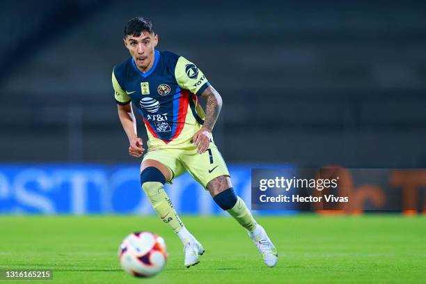 Leonardo Suarez of America drives the ball during the 17th round match between Pumas UNAM and America as part of the Torneo Guard1anes 2021 Liga MX...