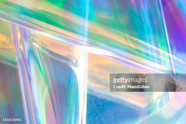 glass on the hologram rainbow color cloth - glass material stock pictures, royalty-free photos & images