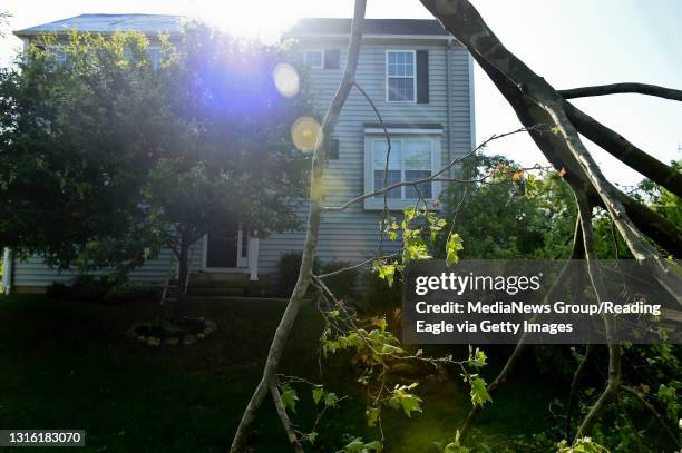 Tornado Follow Up at Village of Country Meadows in Morgantown. John Pope's house on Valley Ponds Drive suffered roof damage and the trees in his...