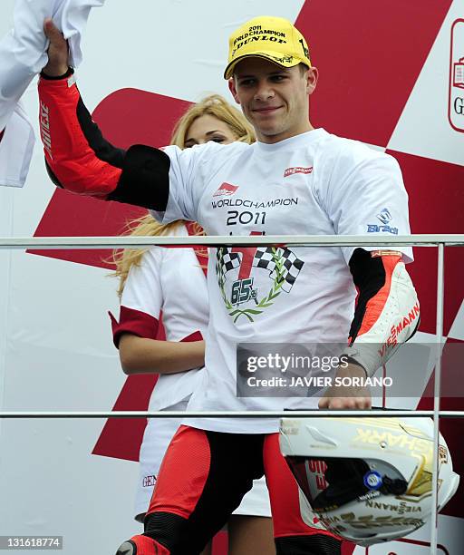 Viessmann Kiefer Racing's German Stefan Bradl celebrates on the posdium of the Moto 2 race during Valencia's Grand Prix at Ricardo Tormo racetrack in...