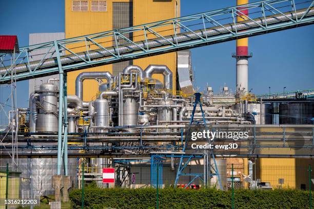 factory of the pulp and paper industry in świecie, poland - paper mill stock pictures, royalty-free photos & images