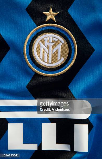 The Inter Milan club badge on their first team home shirt on May 2, 2021 in Manchester, United Kingdom.
