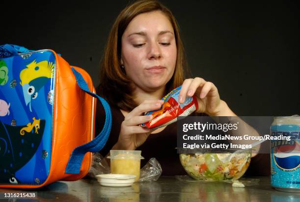 Lauren A. LittleNovember 4, 2006Katie Huber, senior at Wilson, eats her healthy bagged lunch in the Reading Eagle studio.