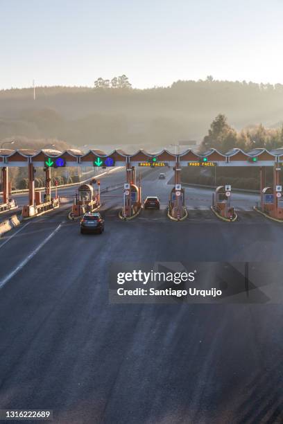 highway toll gate - tolls stock pictures, royalty-free photos & images