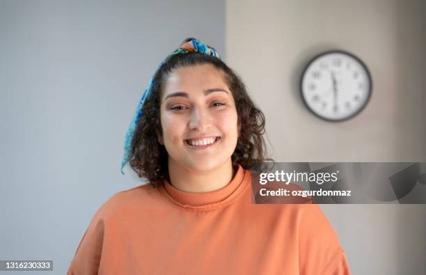 portrait of a young real woman with a friendly smile - fat redhead stock pictures, royalty-free photos & images