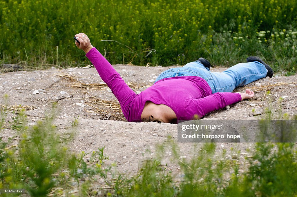 Woman with head in sand