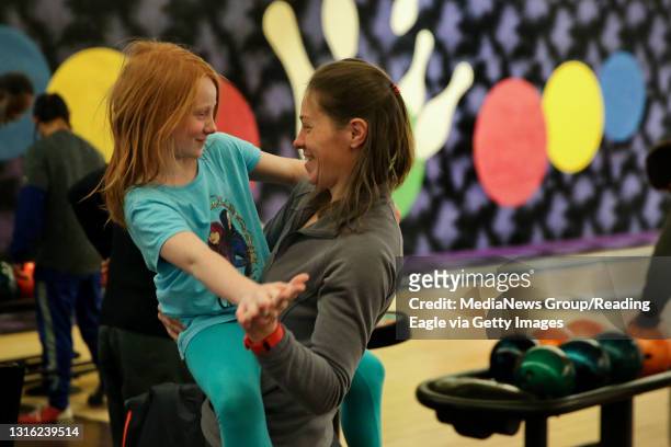 Danielle Henkel of Pike Township dances with her daughter, Gabrielle during a Children's Holiday Party at Berks Lanes hosted by the Tri-County...