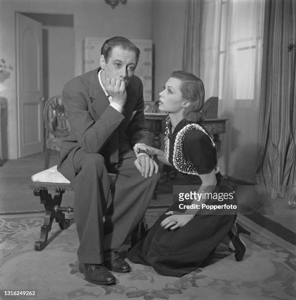 English actor Rex Harrison and German actress Lilli Palmer play the roles of Gaylord Esterbrook and Amanda Smith in a scene from the West End...