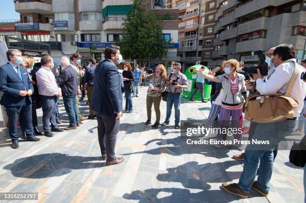 The president of Murcia and president of the Popular Party of the region, Fernando Lopez Miras, greets during the campaign to collect signatures in...