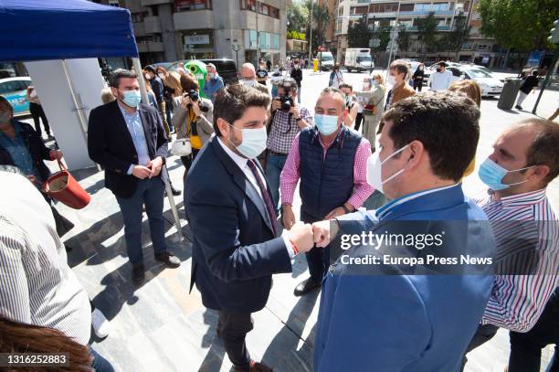 The president of Murcia and president of the Popular Party of the region, Fernando Lopez Miras, greets during the campaign to collect signatures in...