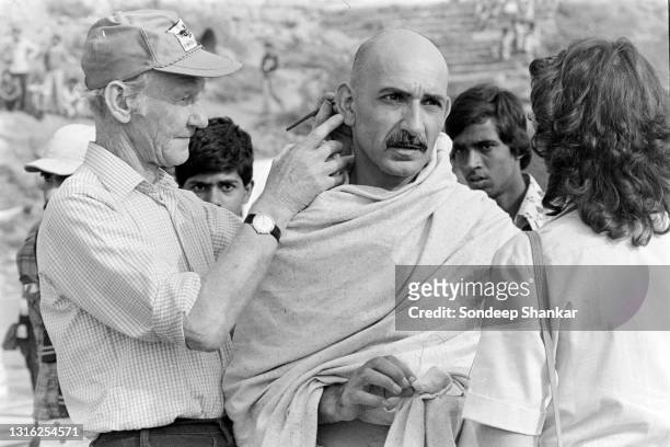 Actor Ben Kinsley playing the role of Mohandas K Gandhi on set during the filming of the movie 'Gandhi', New Delhi, India, December 1980.