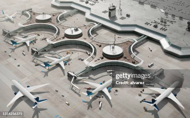 vista de pájaro de la terminal del aeropuerto con aviones estacionados - airport fotografías e imágenes de stock