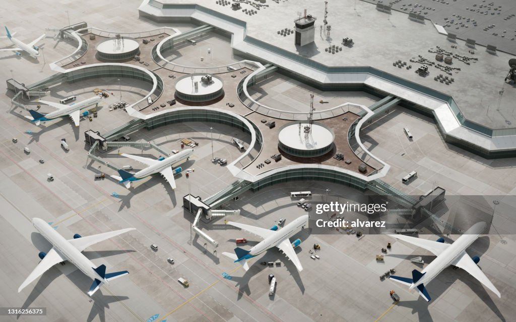 Vista a volo d'uccello del terminal dell'aeroporto con aerei parcheggiati