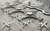 Bird eye view of airport terminal with parked airplanes