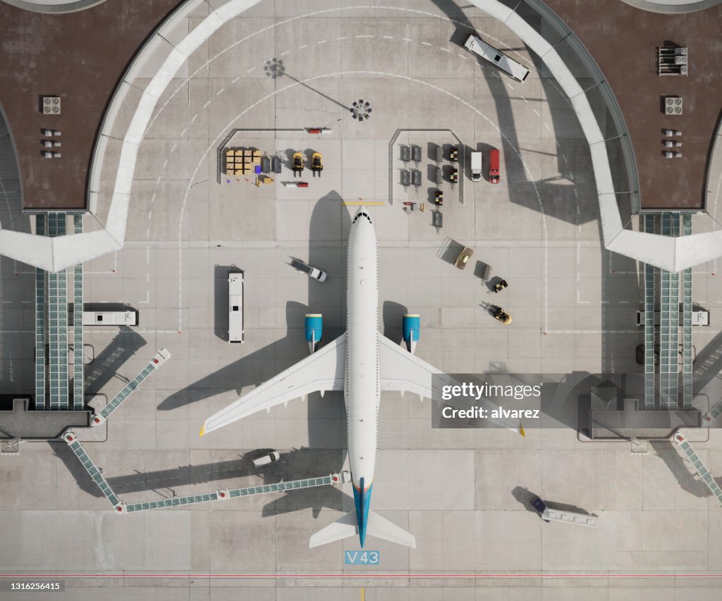 Top-Ansicht des Flugzeugs am Flughafenterminal in 3D