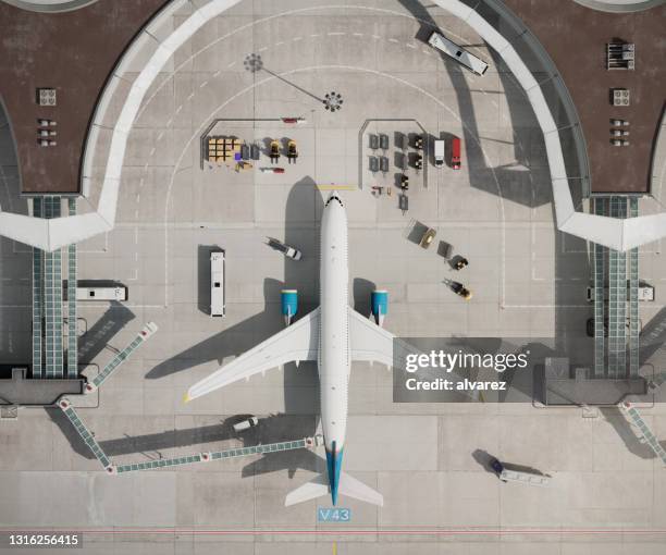 top view of airplane at airport terminal in 3d - aerospace stock pictures, royalty-free photos & images