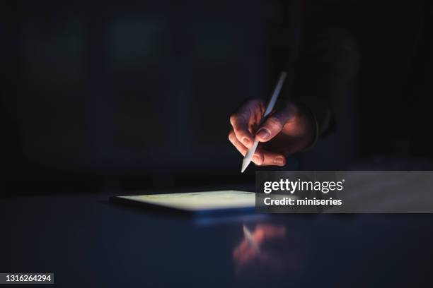 person working with stylus pen and tablet - digitized pen stock pictures, royalty-free photos & images