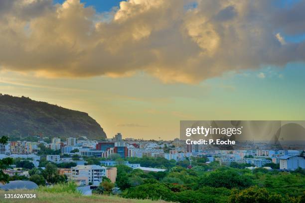 reunion island, saint-denis, the city at sunset from the top of trinity park. - saint denis de la reunión fotografías e imágenes de stock