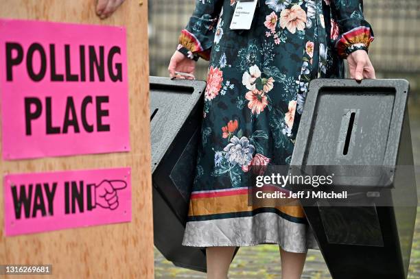 Staff at Edinburgh City Council move ballot boxes as they're taken for distribution to polling stations on May 4, 2021 in Edinburgh, Scotland....