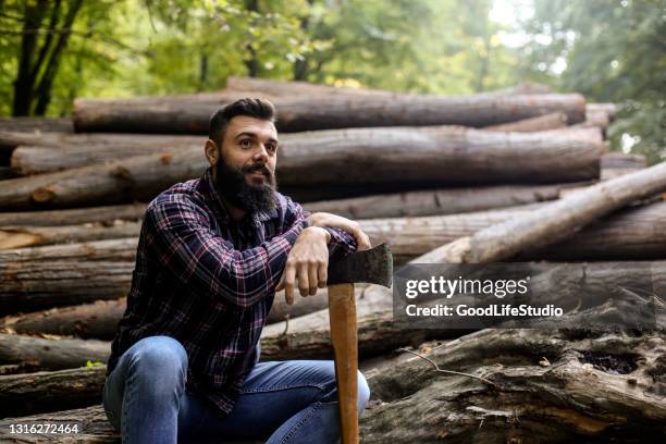 lumberjack taking a break - lumberjack beard stock pictures, royalty-free photos & images