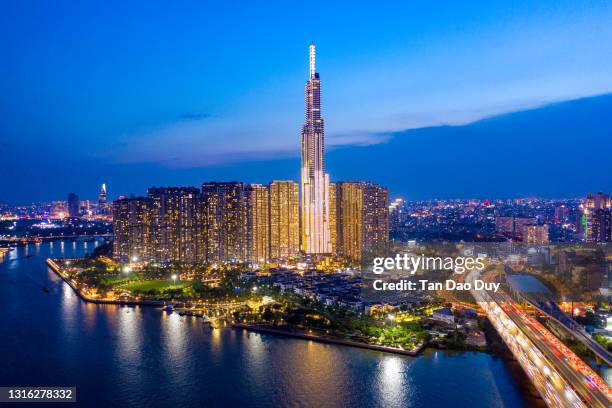 the landmark81 from ho chi minh city, vietnam - may 04, 2021 - aerial view - modern vietnam stockfoto's en -beelden