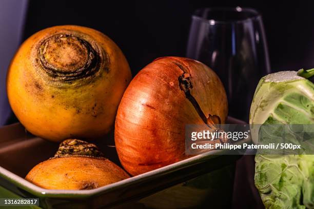 close-up of fruits in bowl on table,france - table nourriture stockfoto's en -beelden