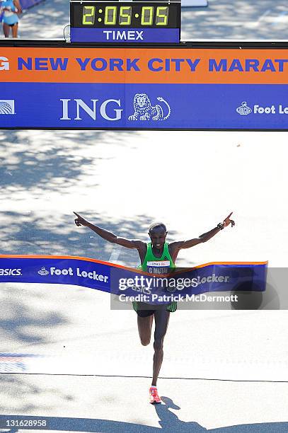 Geoffrey Mutai of Kenya celebrates as he wins the Men's Division of the 42nd ING New York City Marathon in Central Park on November 6, 2011 in New...