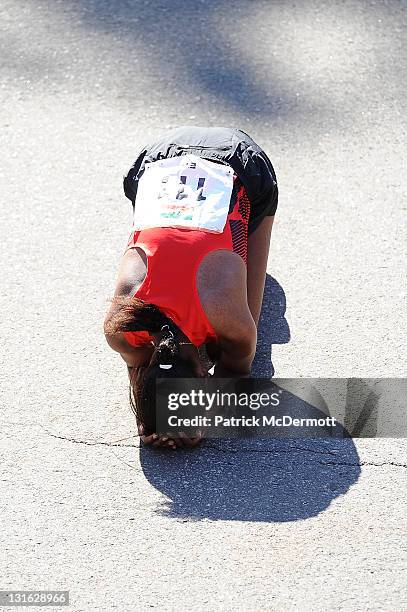 Firehiwot Dado of Ethiopia celebrates after winning the Women's Division of the 42nd ING New York City Marathon in Central Park on November 6, 2011...