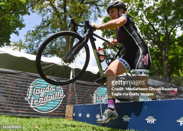 Laura Van Gilder carries her bike over an obstacle during the women's cyclocross. During the second day of the 2019 Reading Radsport festival in...