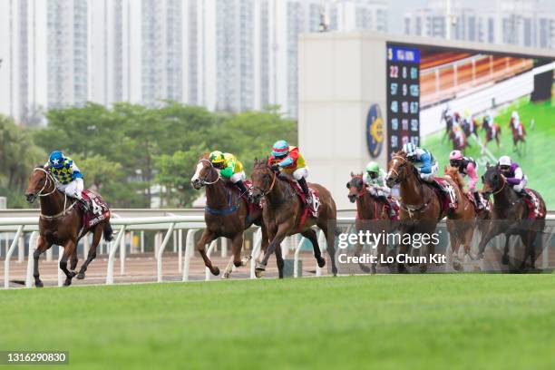 Jockey Alexis Badel riding Wellington wins the Race 5 Chairman's Sprint Prize at Sha Tin Racecourse on April 25, 2021 in Hong Kong.