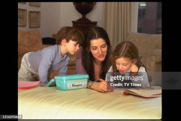 Celebrity chef and food writer Nigella Lawson at home with her children, circa 1998.