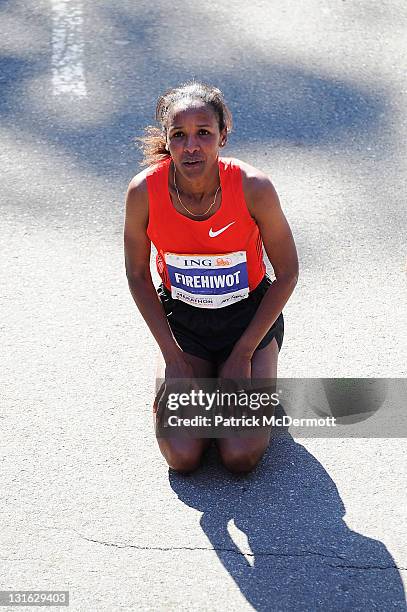 Firehiwot Dado of Ethiopia celebrates after winning the Women's Division of the 42nd ING New York City Marathon in Central Park on November 6, 2011...