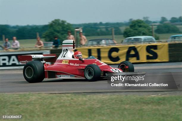 Niki Lauda with the Ferrari 312T, He qualified third and finished eighth, British Grand Prix, Silverstone.