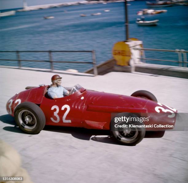 Juan Fangio in his Maserati 250F entering Tabac Corner on his way to the win, Monaco Grand Prix, Monte Carlo.
