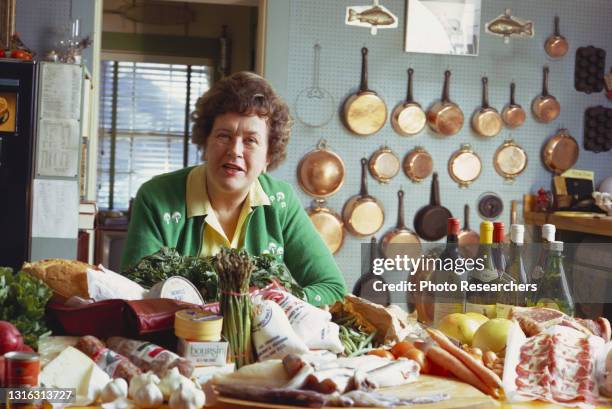 Portrait of American chef, author, cooking teacher, author, and tv host Julia Child as she poses in her kitchen, Cambridge, Massachusetts, 1972.