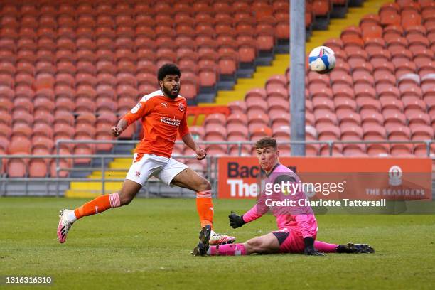 Ellis Simms of Blackpool scores his team's first goal during the Sky Bet League One match between Blackpool and Doncaster Rovers at Bloomfield Road...