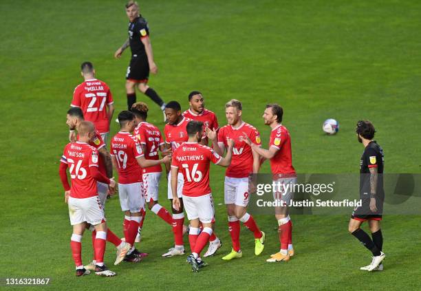 Jayden Stockley of Charlton Athletic celebrates with his team mates after scoring his team's first goal during the Sky Bet League One match between...