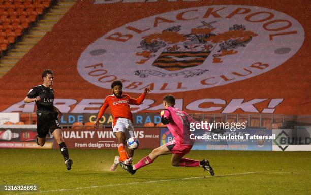 Ellis Simms of Blackpool scores his team's second goal during the Sky Bet League One match between Blackpool and Doncaster Rovers at Bloomfield Road...