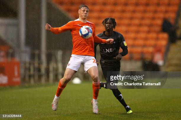 Daniel Ballard of Blackpool controls the ball during the Sky Bet League One match between Blackpool and Doncaster Rovers at Bloomfield Road on May...