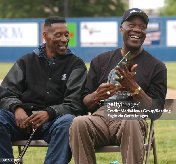 Photo by Krissy Krummenacker 200601236 Jim "Mudcat" Grant, right, laughs after being presented with a fake Cy Young Award as fellow ace pitcher Mike...