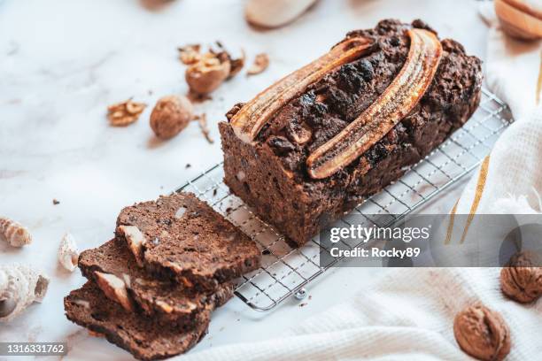 banana bread heaven with walnuts - banana loaf stock pictures, royalty-free photos & images